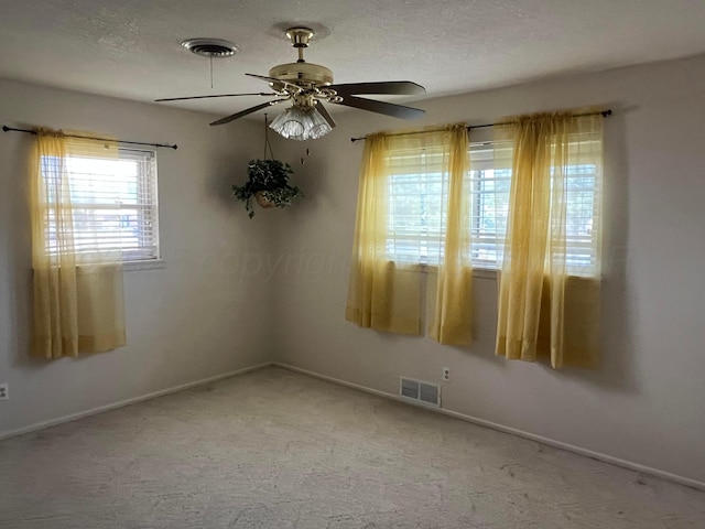 415 Mesquite Ave, Amarillo, TX 79108 - empty room with ceiling fan, carpet floors, and baseboards