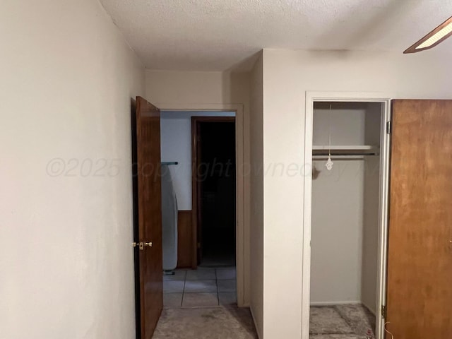 415 Mesquite Ave, Amarillo, TX 79108 - unfurnished bedroom with a closet and a textured ceiling