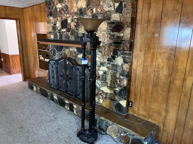 415 Mesquite Ave, Amarillo, TX 79108 - detailed view of wooden walls, carpet, and a stone fireplace