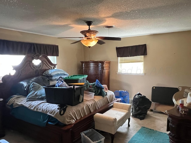 415 Mesquite Ave, Amarillo, TX 79108 - bedroom with carpet, a textured ceiling, and ceiling fan