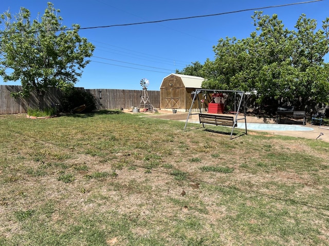 415 Mesquite Ave, Amarillo, TX 79108 - view of yard featuring a shed and an outbuilding
