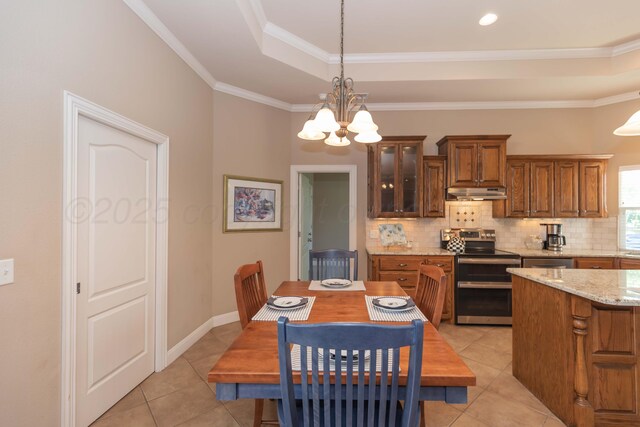 6600 Pepper Tree Pl, Amarillo, TX 79124 - kitchen featuring range with two ovens, under cabinet range hood, light tile patterned floors, decorative backsplash, and glass insert cabinets