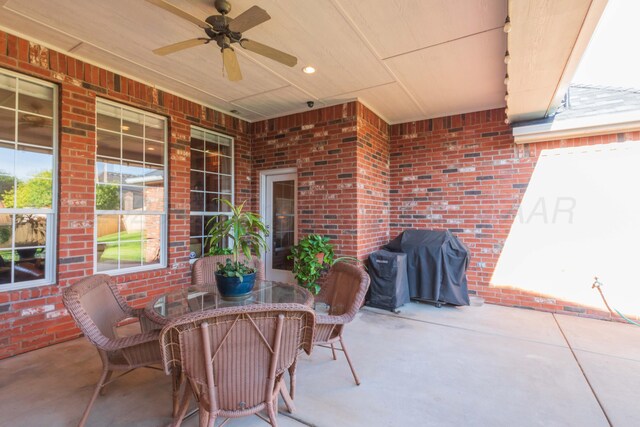 6600 Pepper Tree Pl, Amarillo, TX 79124 - view of patio / terrace with ceiling fan, a grill, and outdoor dining area