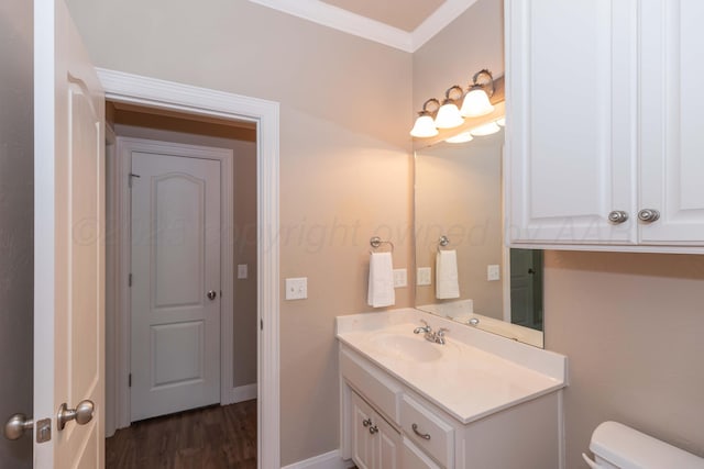 6600 Pepper Tree Pl, Amarillo, TX 79124 - bathroom with vanity, ornamental molding, and wood finished floors