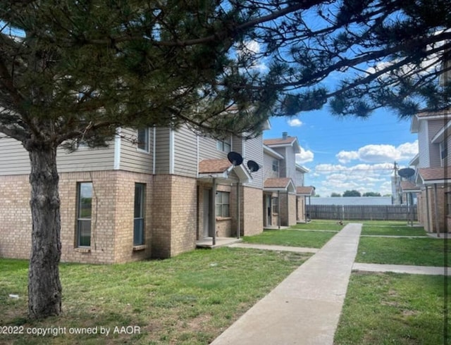 view of property exterior featuring a yard