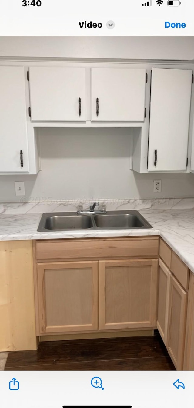 kitchen featuring sink, white appliances, and light tile patterned floors