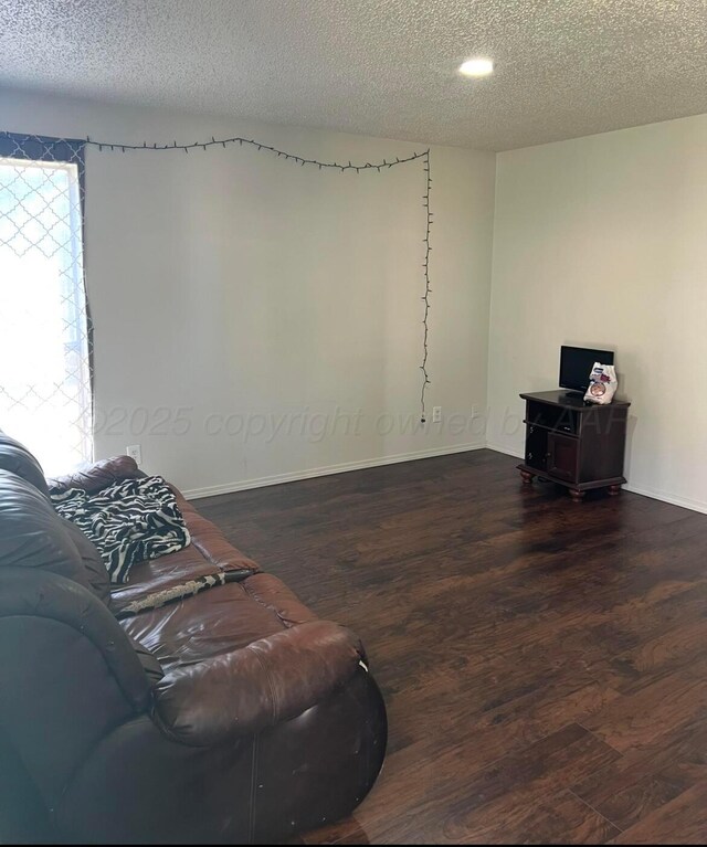 dining room with a textured ceiling and ceiling fan