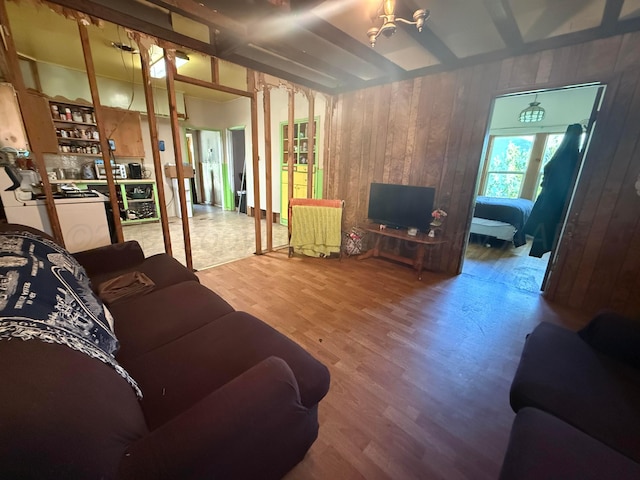 2107 Hemlock St, Borger, TX 79007 - living room featuring wooden walls and wood finished floors