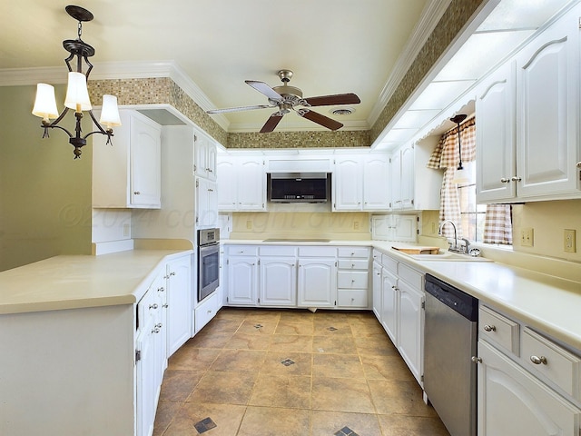 kitchen featuring appliances with stainless steel finishes, ornamental molding, sink, decorative light fixtures, and white cabinets