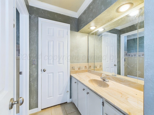 bathroom with vanity, tile patterned floors, and ornamental molding
