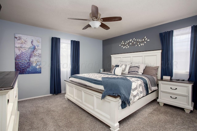 5117 Mesa Cir, Amarillo, TX 79109 - carpeted bedroom with a ceiling fan