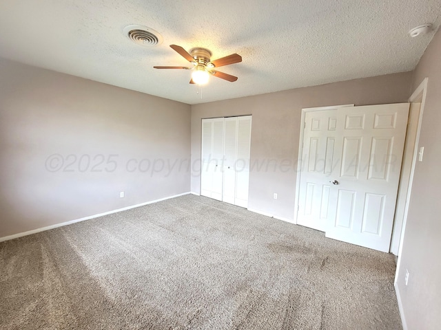 1312 Coffee St, Pampa, TX 79065 - unfurnished bedroom featuring ceiling fan, carpet floors, and a textured ceiling