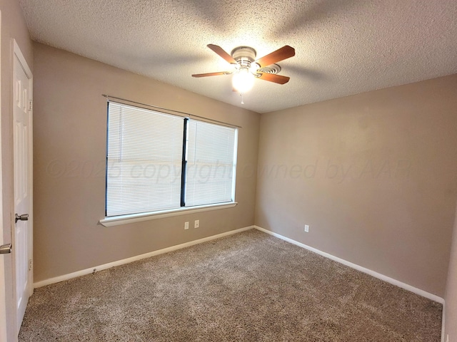 1312 Coffee St, Pampa, TX 79065 - unfurnished room with ceiling fan, carpet flooring, and a textured ceiling