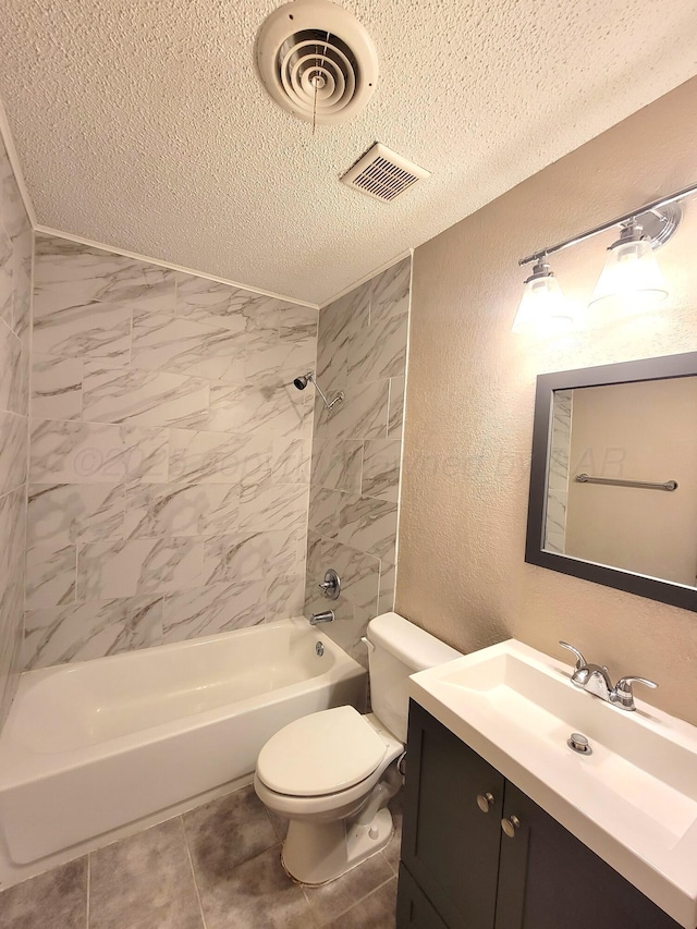 1312 Coffee St, Pampa, TX 79065 - full bathroom featuring tile patterned flooring, toilet, tiled shower / bath, a textured ceiling, and vanity