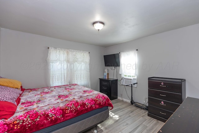2503 SW 5th Ave, Amarillo, TX 79106 - bedroom with light wood finished floors and cooling unit
