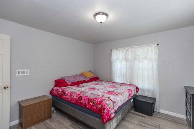 2503 SW 5th Ave, Amarillo, TX 79106 - bedroom featuring light wood-style floors and baseboards