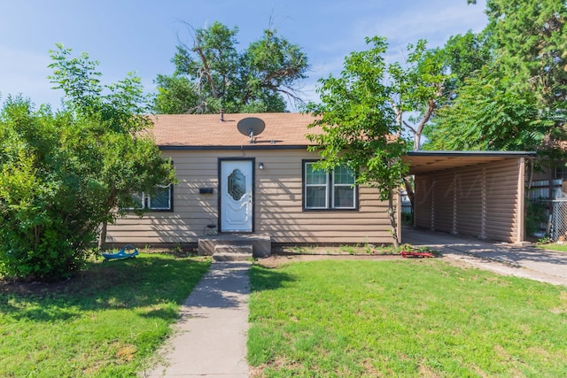 2503 SW 5th Ave, Amarillo, TX 79106 - view of front of property with a front yard, driveway, and a carport