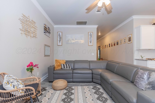 1738 Wesleyan St, Amarillo, TX 79118 - living room featuring ceiling fan, light hardwood / wood-style floors, and crown molding