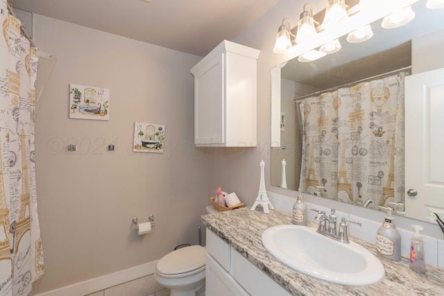 1738 Wesleyan St, Amarillo, TX 79118 - bathroom featuring vanity, tile patterned floors, and toilet