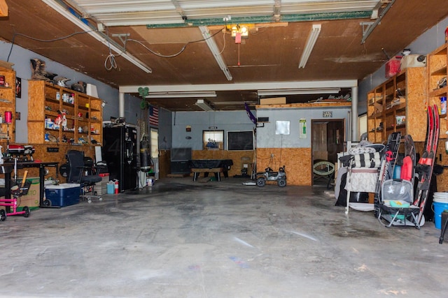 garage with a workshop area