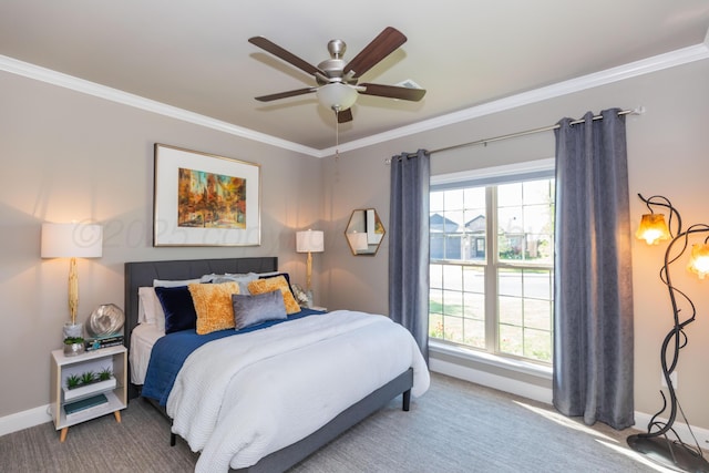 6900 Tatum Cir, Amarillo, TX 79119 - carpeted bedroom featuring ornamental molding, multiple windows, and ceiling fan