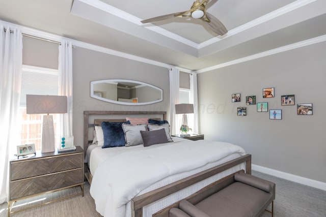 6900 Tatum Cir, Amarillo, TX 79119 - bedroom featuring a raised ceiling, crown molding, ceiling fan, and carpet floors