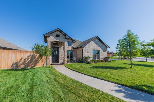 6900 Tatum Cir, Amarillo, TX 79119 - french provincial home featuring brick siding