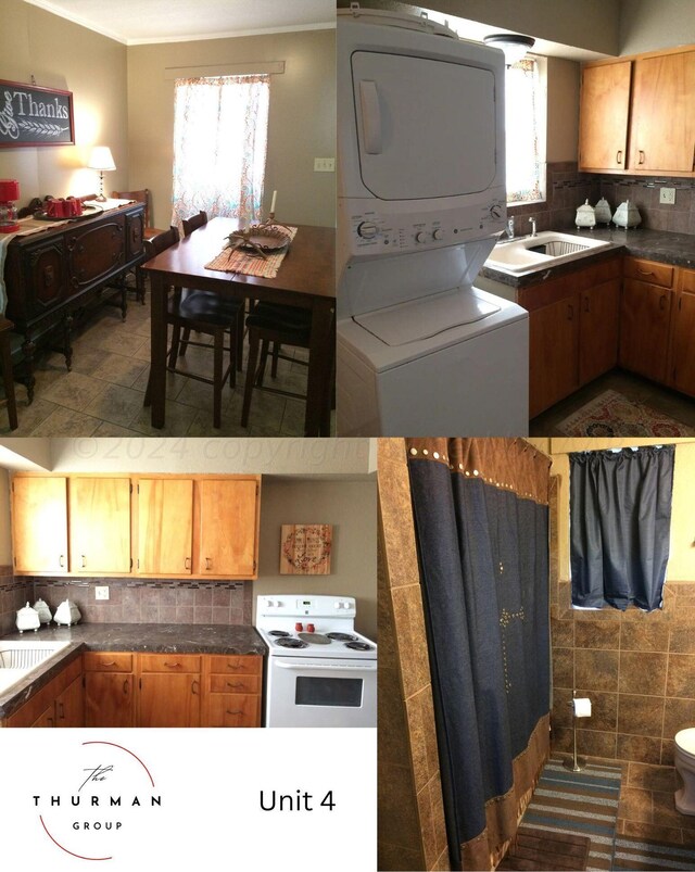 kitchen featuring stacked washing maching and dryer, sink, backsplash, and electric range