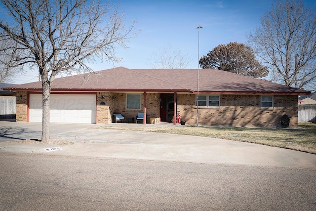 single story home featuring a garage