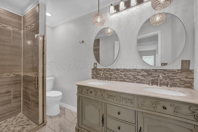 bathroom with a shower stall, toilet, crown molding, decorative backsplash, and double vanity