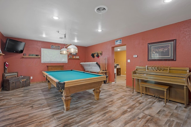 rec room with pool table and hardwood / wood-style flooring