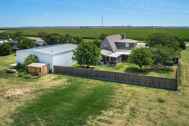 birds eye view of property featuring a rural view