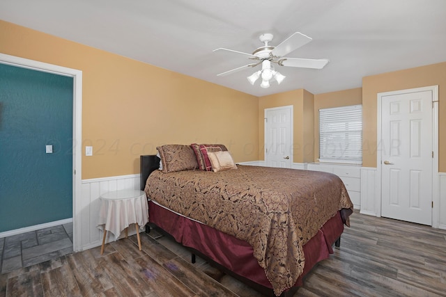 bedroom featuring dark wood-type flooring and ceiling fan