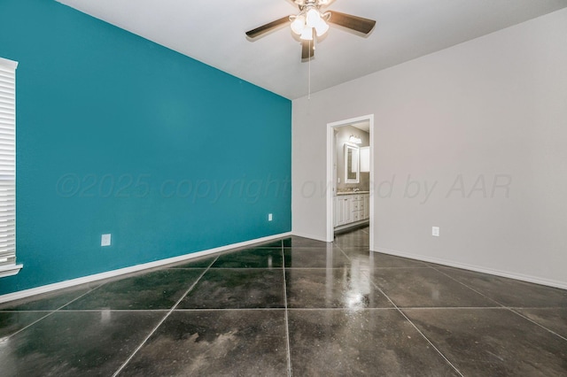 303 Loesh St, Amarillo, TX 79118 - empty room with ceiling fan and concrete floors