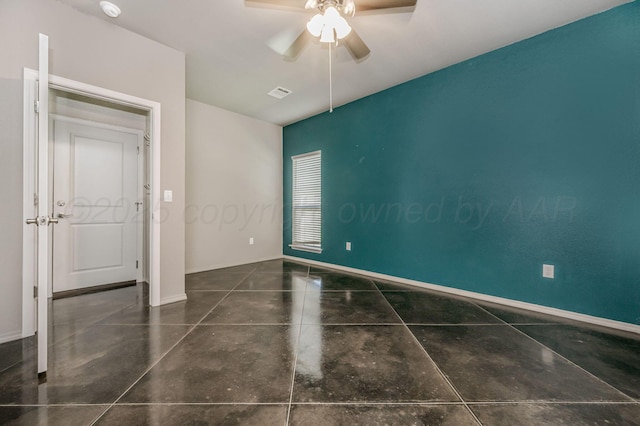 303 Loesh St, Amarillo, TX 79118 - spare room featuring a ceiling fan, a smoke detector, and concrete flooring