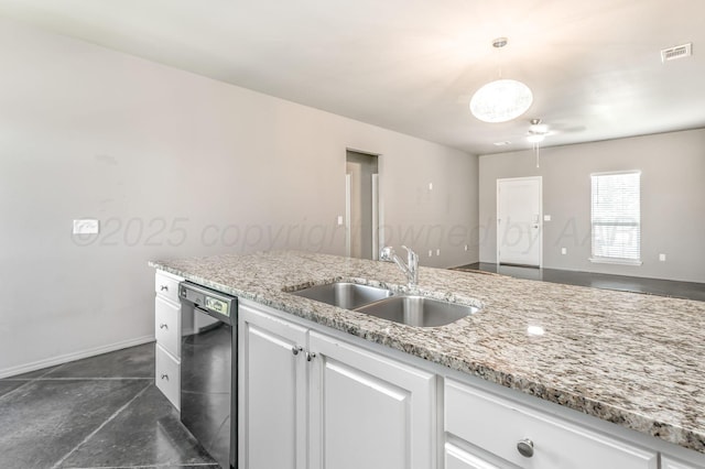 303 Loesh St, Amarillo, TX 79118 - kitchen with dishwasher, white cabinetry, finished concrete flooring, and light stone countertops