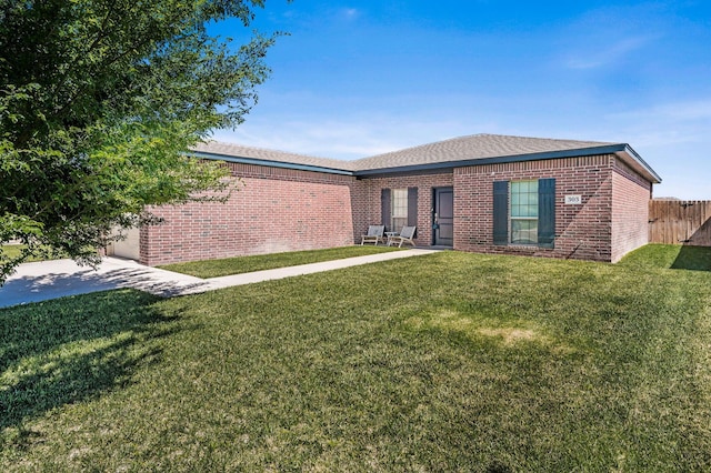 303 Loesh St, Amarillo, TX 79118 - back of house featuring brick siding