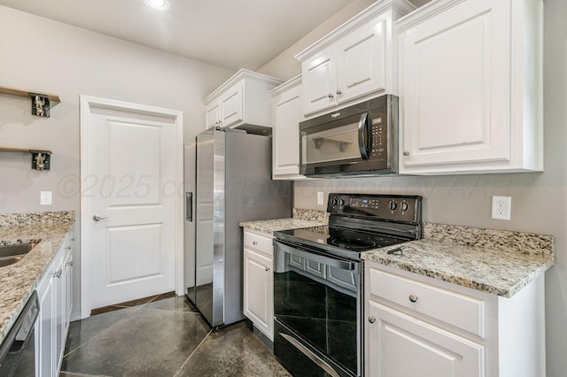 303 Loesh St, Amarillo, TX 79118 - kitchen featuring black appliances, white cabinets, light stone countertops, and recessed lighting