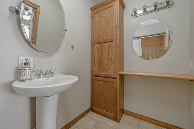 504 High St, Claude, TX 79019 - full bathroom featuring baseboards, a shower with curtain, and tile patterned flooring