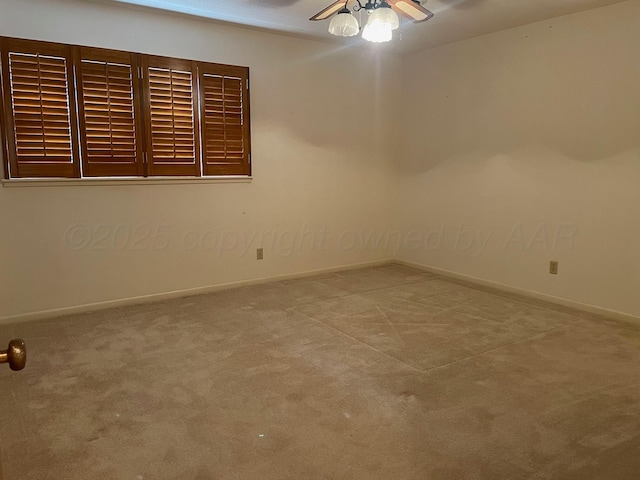 unfurnished room featuring carpet floors and ceiling fan