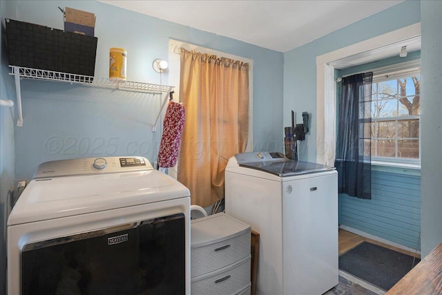 washroom with washer and dryer and laundry area