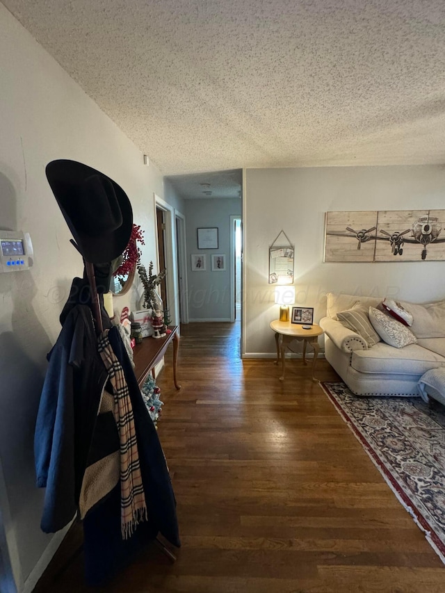 2318 Atkinsen St, Amarillo, TX 79106 - hall featuring a textured ceiling and wood finished floors