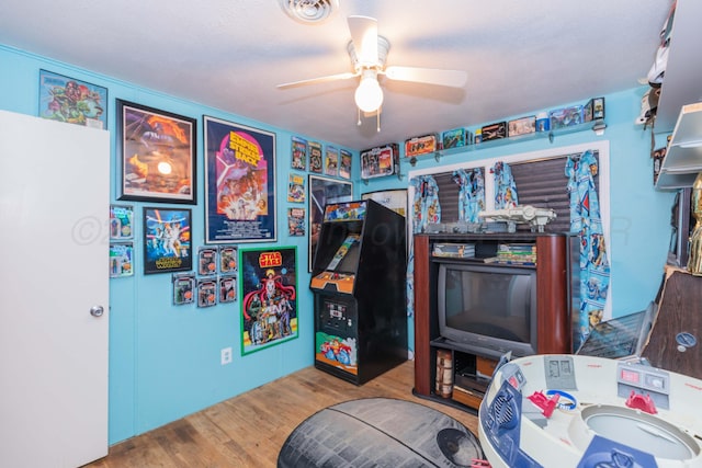 1960 S Highland St, Amarillo, TX 79103 - playroom with ceiling fan and wood finished floors