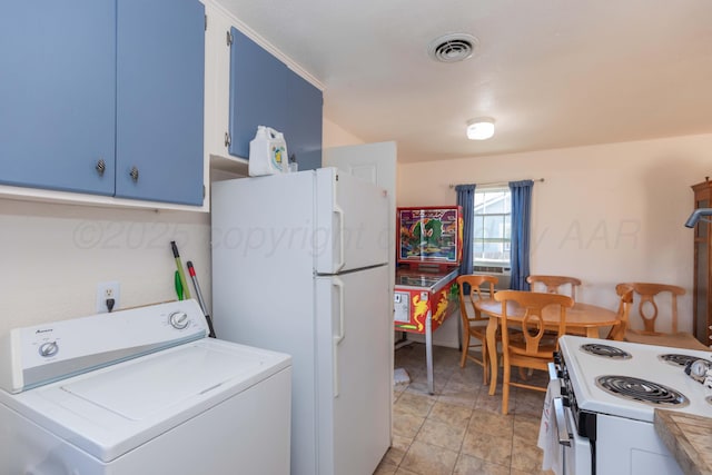 1960 S Highland St, Amarillo, TX 79103 - laundry area featuring washer / clothes dryer and light stone finish flooring