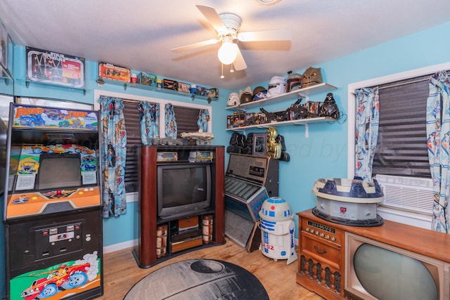 1960 S Highland St, Amarillo, TX 79103 - recreation room with ceiling fan and wood finished floors
