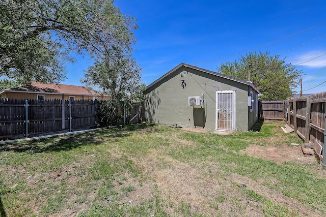view of yard with a fenced backyard
