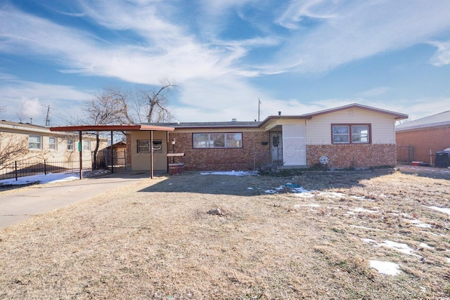 ranch-style home with a carport