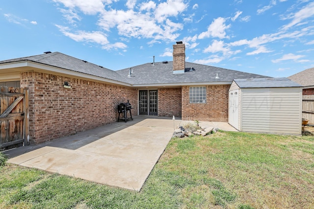 4103 San Angelo Ave, Amarillo, TX 79118 - rear view of property with brick siding, a patio area, a chimney, and a gate