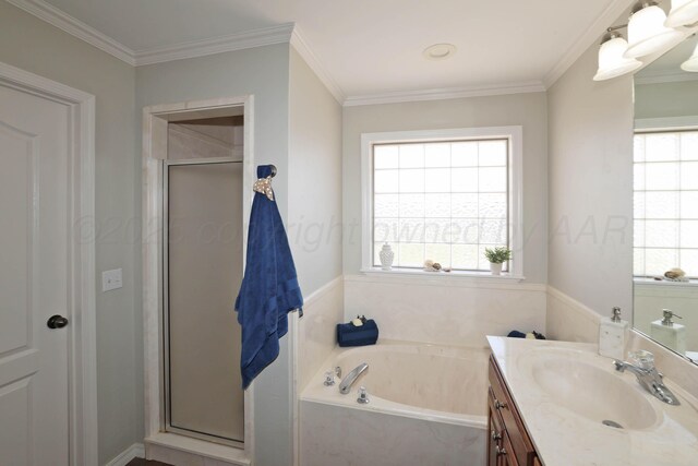 4103 San Angelo Ave, Amarillo, TX 79118 - bathroom featuring vanity, a stall shower, a bath, and ornamental molding