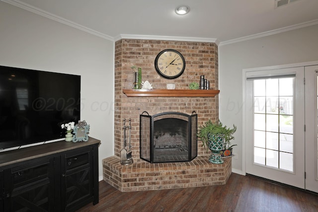 4103 San Angelo Ave, Amarillo, TX 79118 - living area featuring ornamental molding, a fireplace, dark wood-style flooring, and baseboards